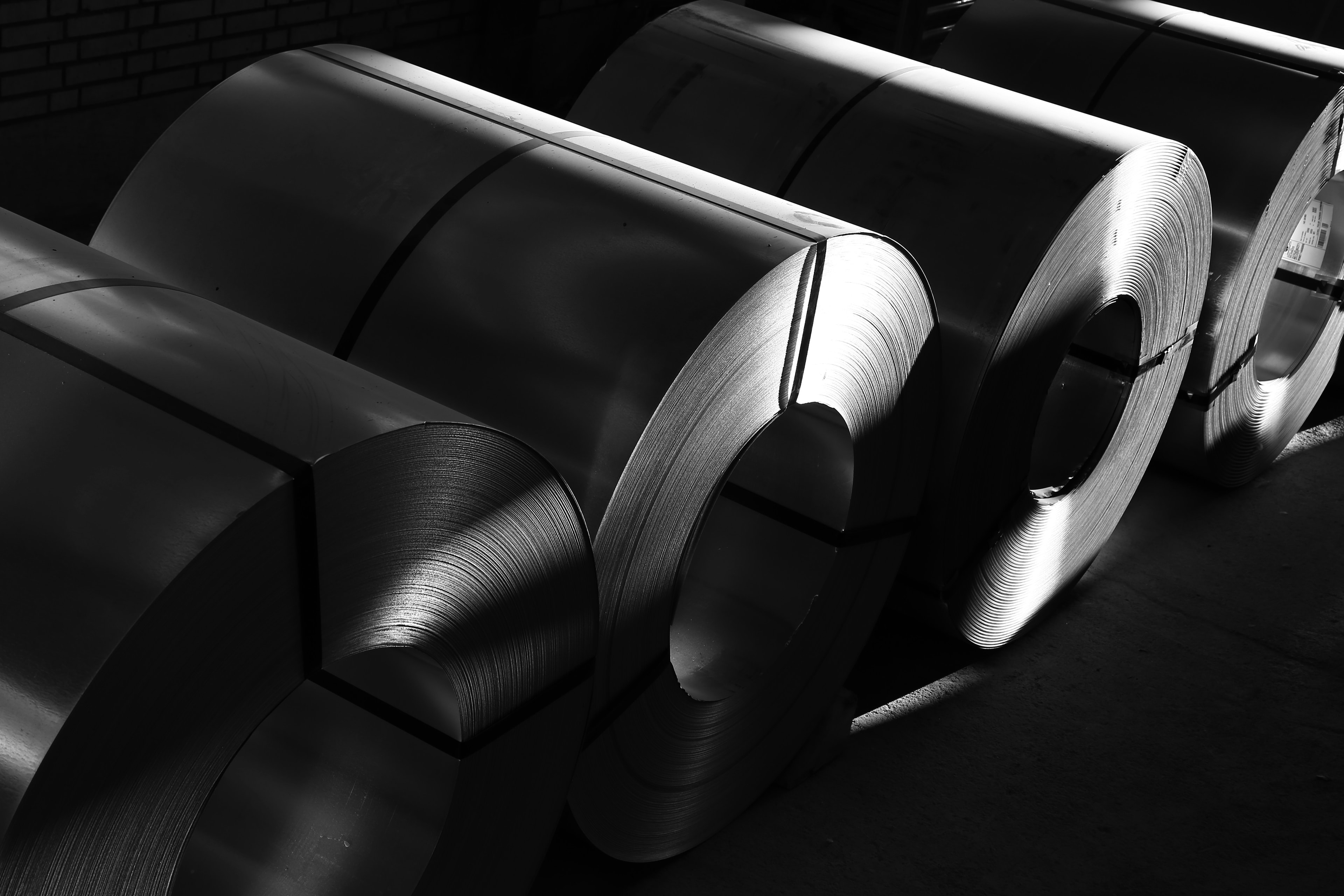 Steel rolls in manufacturing facility